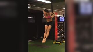 She's doing this muscle-up in real time