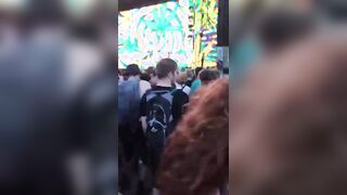 Festival girl gets fingering from behind and carry on getting herself off in the middle of a crowd
