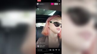 Pink hair drive in car sunglasses